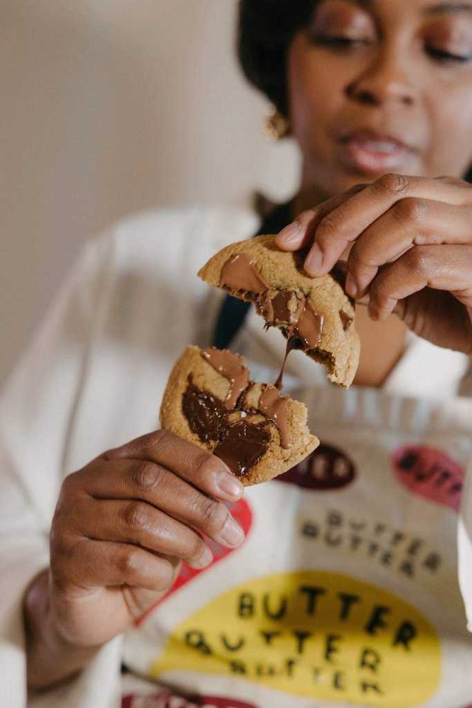 Breaking a fresh Brown Sugar Delights cookie